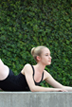 Houston Ballerina poses by greenery