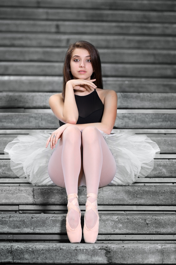 ballerina poses by the wortham center steps