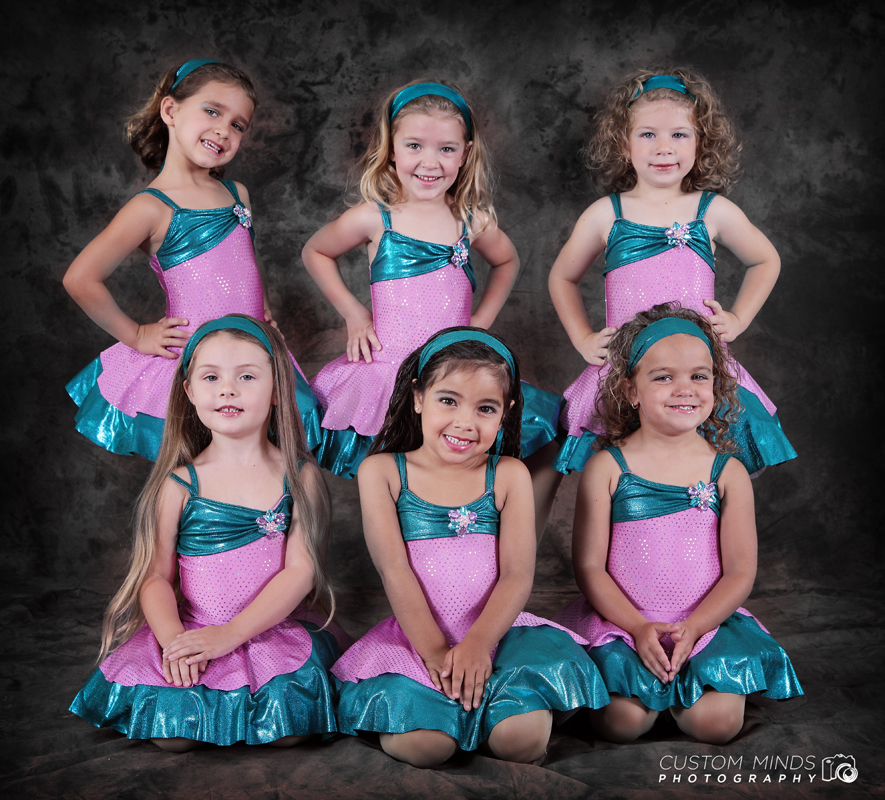 six children pose for a group picture
