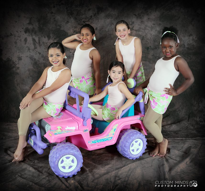 childrens dance group with jeep power wheel. 