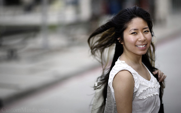 walking across the street in the wind