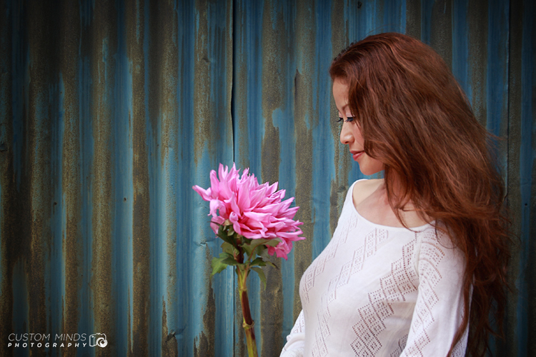 artist with pink flower in tokyo