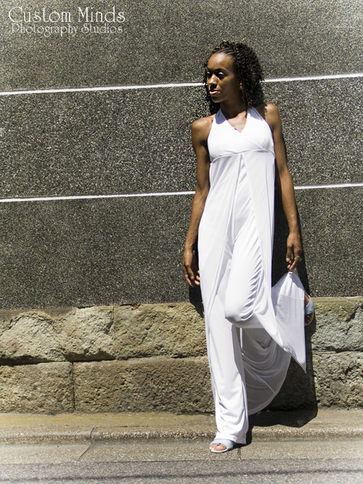 white dress by a concrete wall in tokyo japan