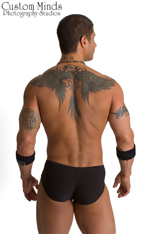 guy displaying his tats at the studio