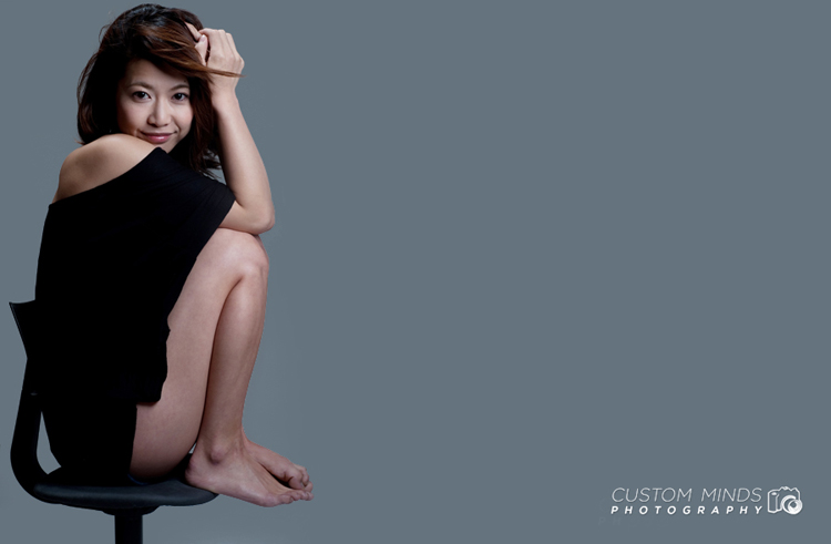 model in chair at the studio