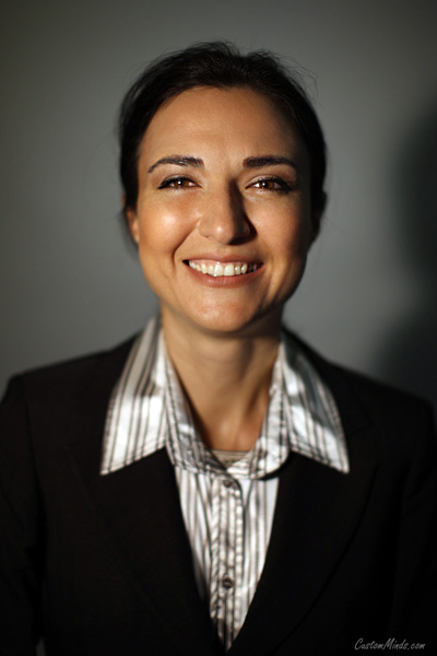 employee headshot with woman in suit