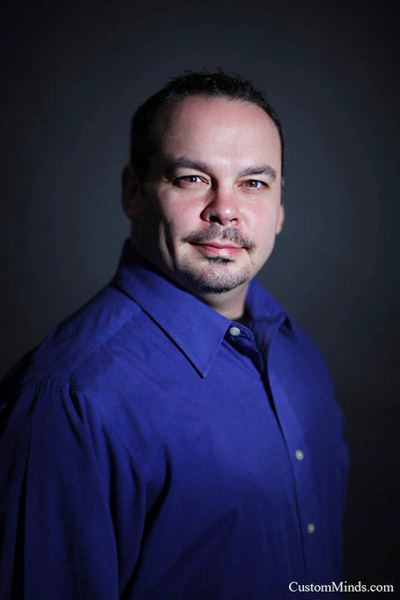 corporate headshot with man in suit