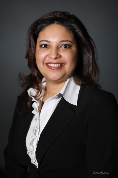 corporate headshot with woman in suit