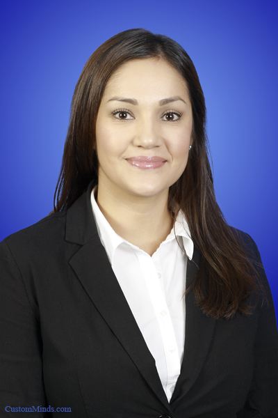 woman in suit with blue background