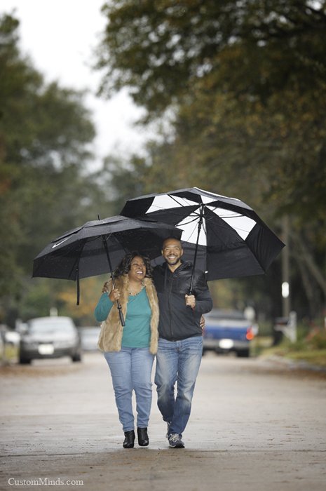 mom and son taking a stroll in the rain in katy texas
