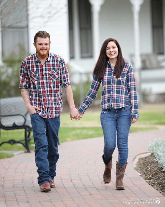 holding hands at katy heritage park in katy texas