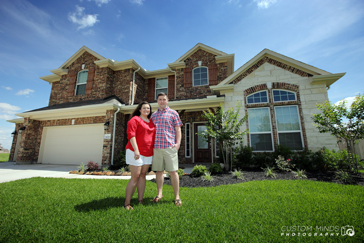 cypress family portrait with house