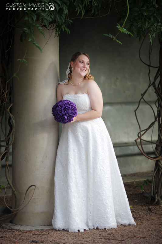 Bride smiles during photo shoot at Hermann Park in Houston Texas.