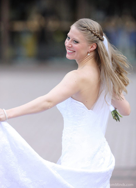Bride twirling around at the Wortham Center in Houston Texas