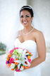 Bride smiling with her bouquet in the Woodlands, Texas
