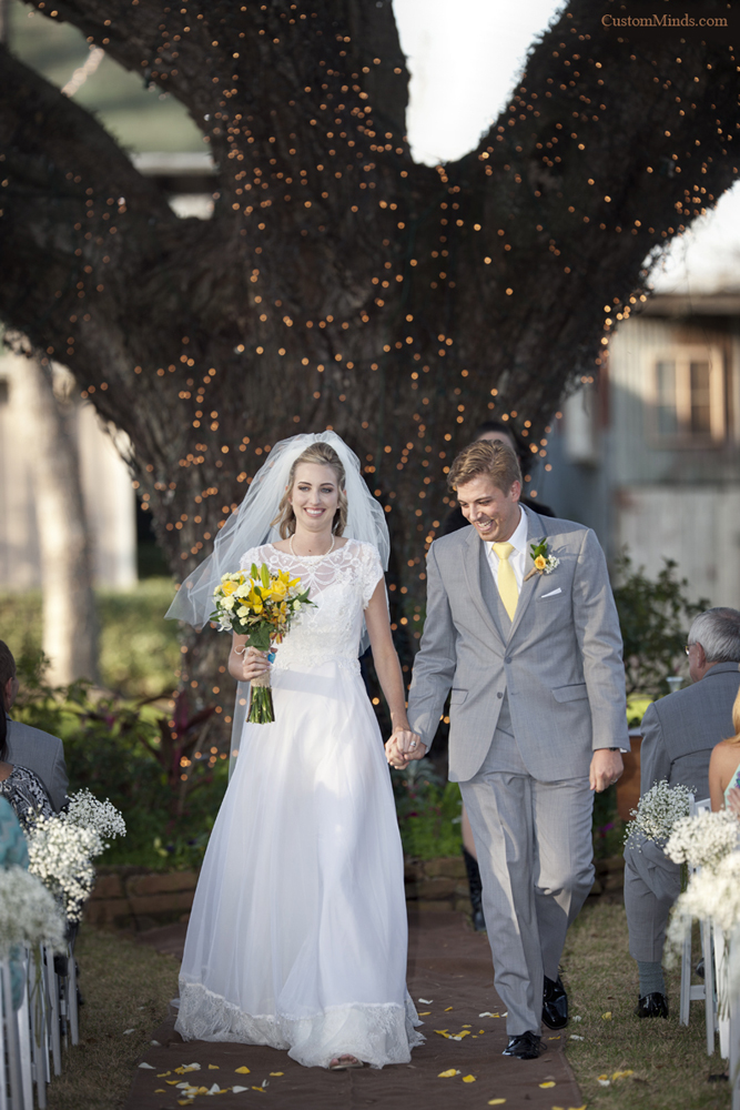 holding hands while leaving the altar