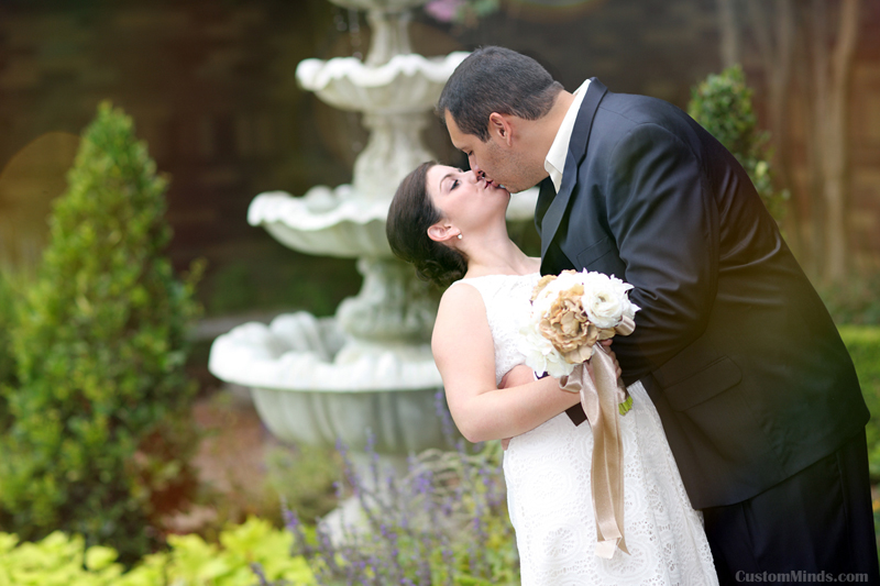 kissing in front of St Laurence Catholic Church in Sugarland Texas