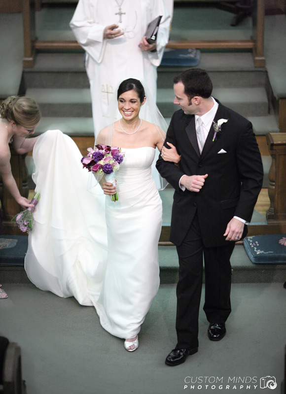 Bride and Groom leaving the altar at a Church near the Museum District in Houston Texas