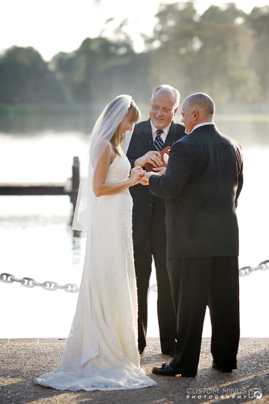 Exchanging rings at the Woodlands golf Course Chapel