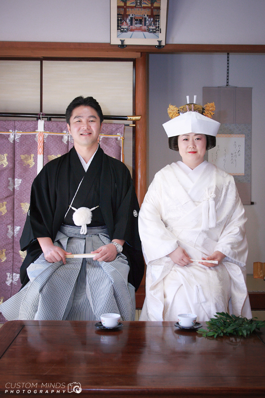 Bride and Groom doing the Ocha Ceremony in Tokyo Japan at the famous Asakusa Shrine