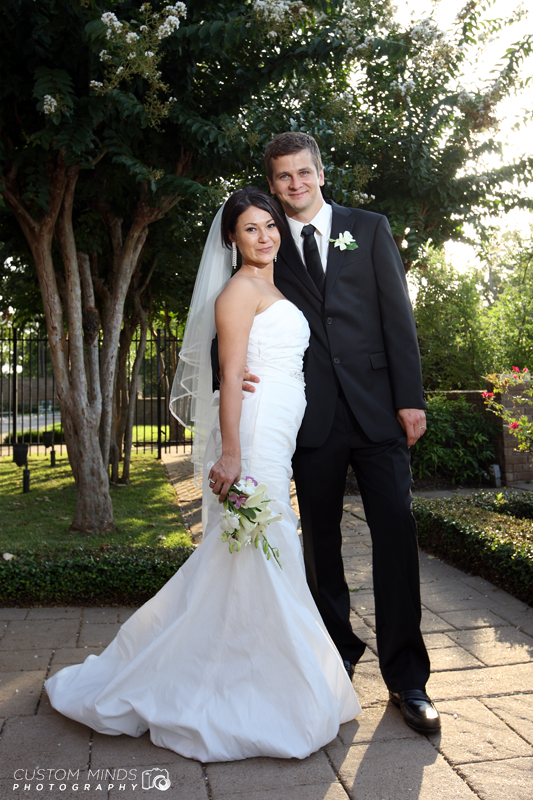 Bride and Groom pose after the wedding near Katy Texas
