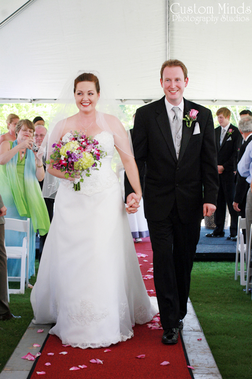 Bride and Groom in Navasota walking down the aisle