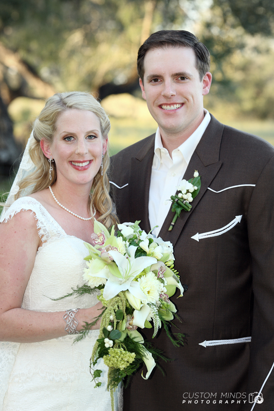 Bride and Groom posing with bouquet near Alice Texas