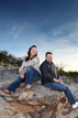 Sitting on rocks during a Pheonix Arizona engagement session