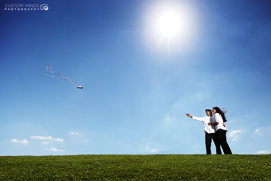 Flying kites at Hermann Park engagement session
