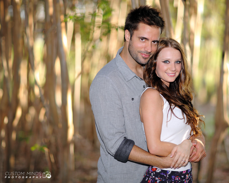 Couple smiling at Memorial Park during an engagement session