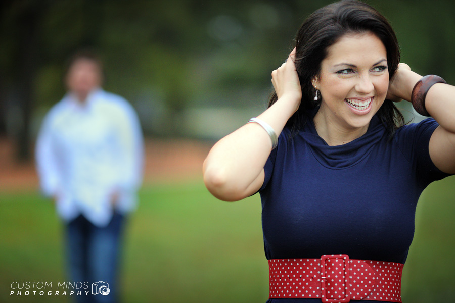 throwing hair back at a Hermann Park engagement session