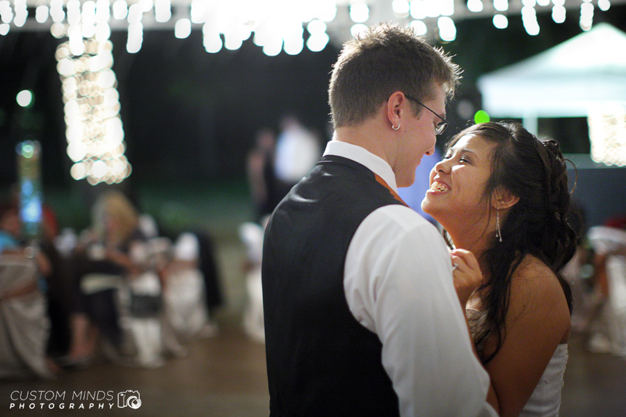 Bride and Groom dancing in their outdoor wedding reception in Houston Texas