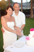 Bride and Groom cut their cake during the wedding reception in Cabo San Lucas Mexico