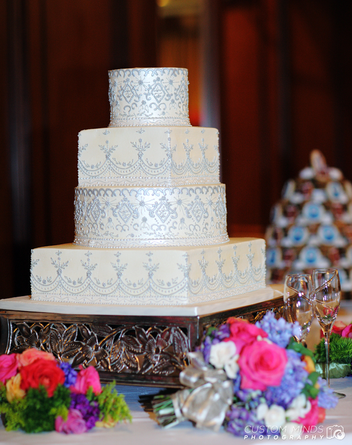 Wedding cake with flowers at the Houstonian ballroom in Houston Texas