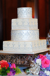 Wedding cake with flowers at the Houstonian ballroom in Houston Texas