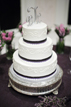 Wedding Cake with surrounding flowers at a reception in Austin Texas