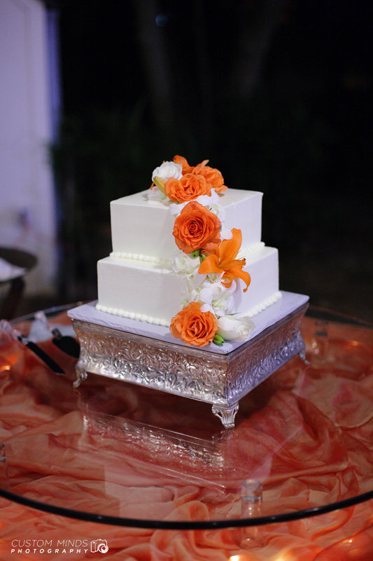 Wedding Cake with flowers at a reception in Friendswood Texas