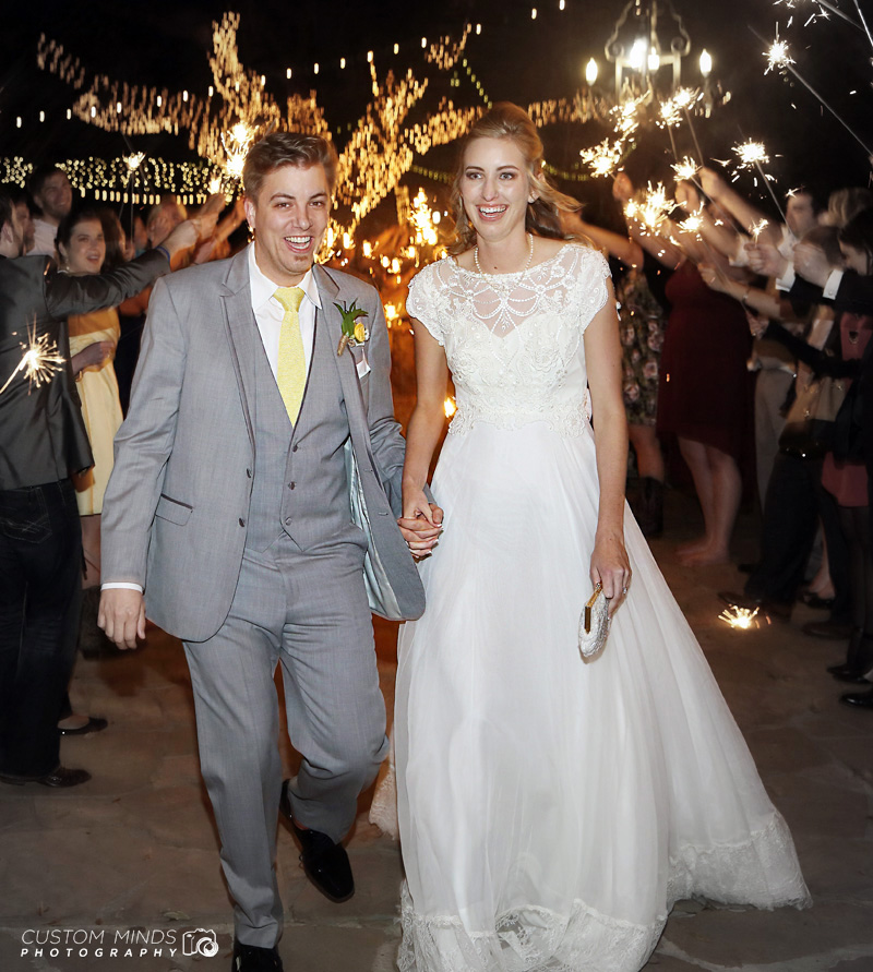 Grand exit of the Bride and Groom from Oak Tree Manor in Spring Texas