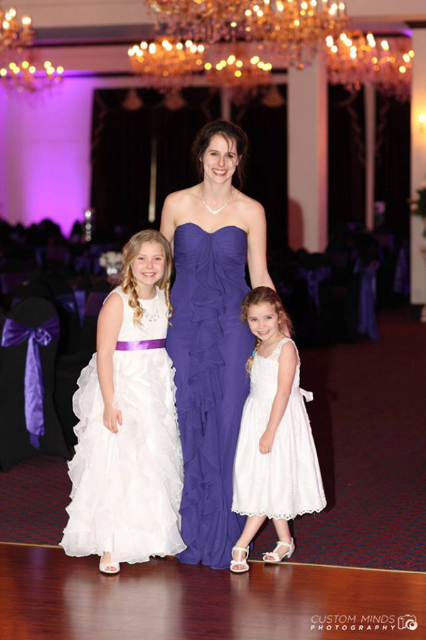 bridesmaid and flower girls posing at the Sterling Banquet Hall in Houston Texas